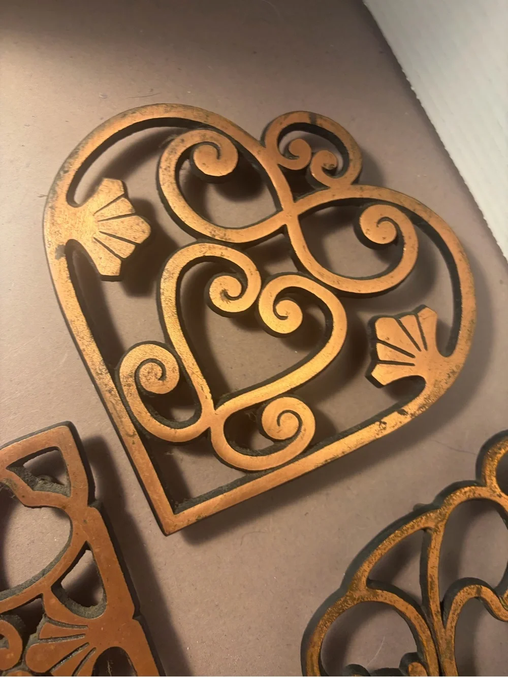 Pampered Chef Copper-Tone Decorative Cast Iron Trivets Set